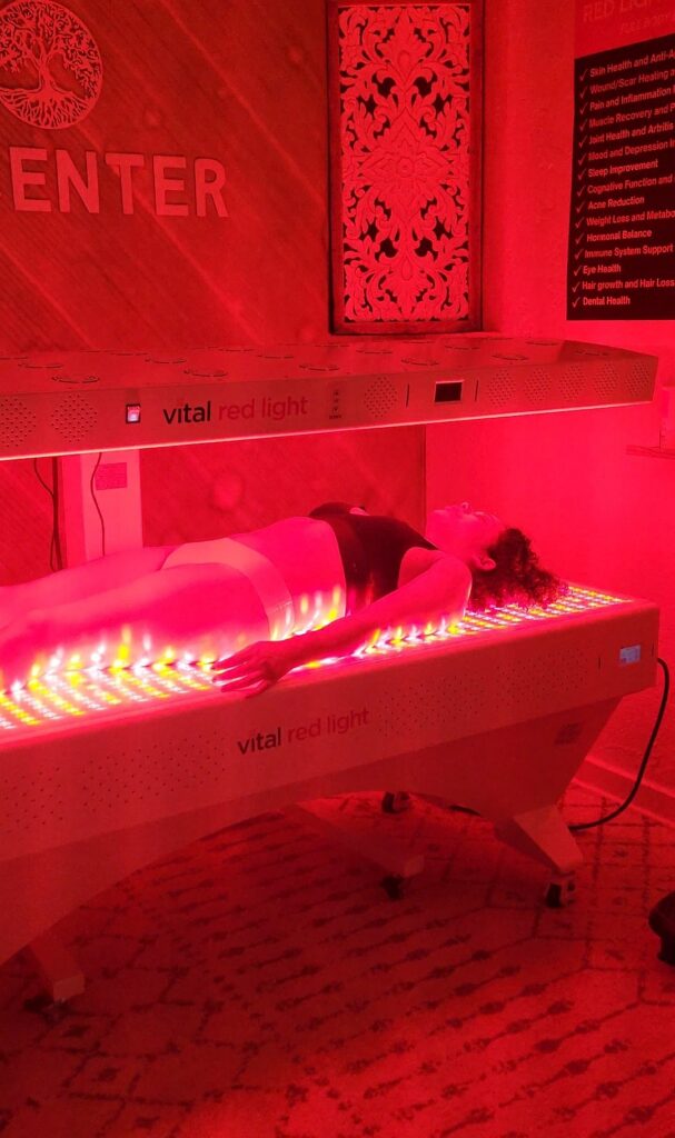 Medical-grade full-body red light therapy bed at All Natural Wellness Center in Fort Lauderdale.