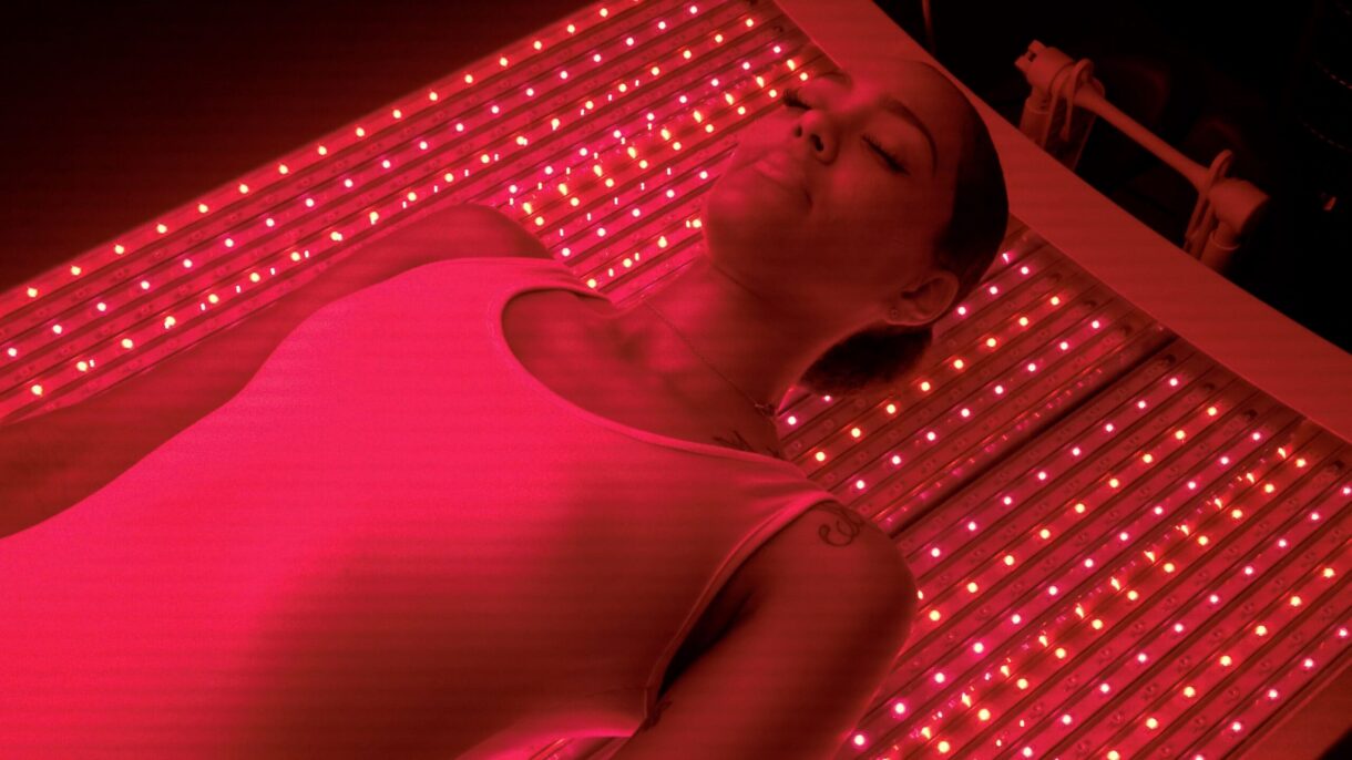 Medical-grade full-body red light therapy bed at All Natural Wellness Center in Fort Lauderdale.