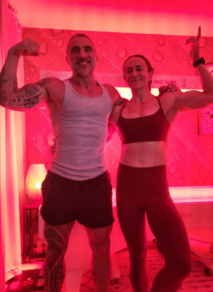 Client after a red light therapy bed session in Fort Lauderdale