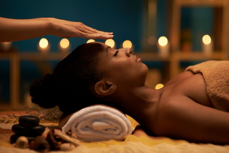 Massage therapist explaining types of massage at All Natural Wellness Center in Fort Lauderdale.