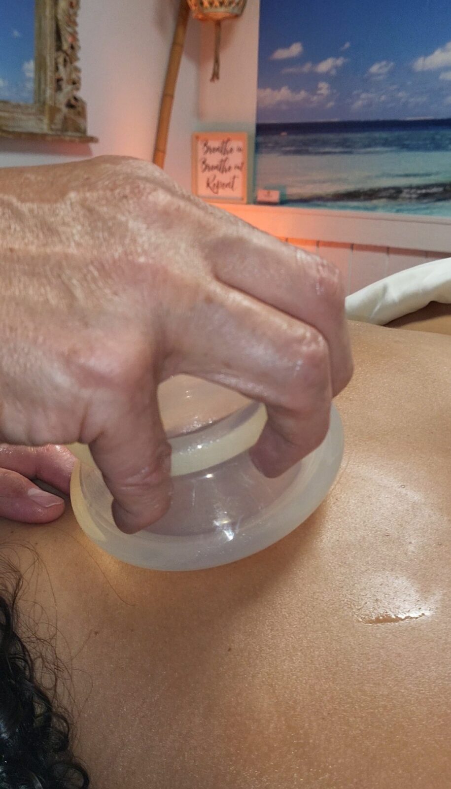 Therapeutic massage using cupping